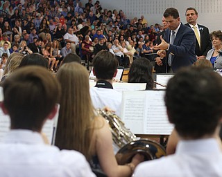 Jeffrey Hvizdos directs the band during the Poland Seminary High School Graduation, Saturday, May 27, 2017 in Poland...(Nikos Frazier | The Vindicator)