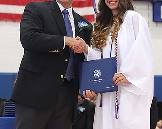 Joelle Abi Habib shakes board member James Lavorini's hand after receiving her diploma during the Poland Seminary High School Graduation, Saturday, May 27, 2017 in Poland...(Nikos Frazier | The Vindicator)