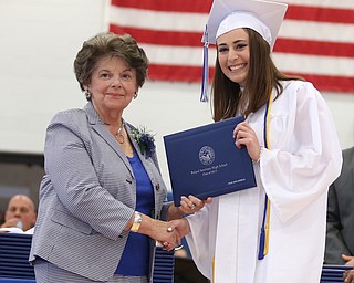 Emily Cammack shakes board member Elinor Zedaker's hand after receiving her diploma during the Poland Seminary High School Graduation, Saturday, May 27, 2017 in Poland...(Nikos Frazier | The Vindicator)