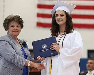 Sydney Frost shakes board member Elinor Zedaker's hand after receiving her diploma during the Poland Seminary High School Graduation, Saturday, May 27, 2017 in Poland...(Nikos Frazier | The Vindicator)
