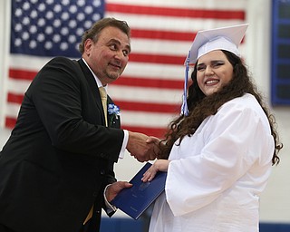 Yiannoula Katsadas shakes board member Larry Dinopoulos's hand after receiving her diploma during the Poland Seminary High School Graduation, Saturday, May 27, 2017 in Poland...(Nikos Frazier | The Vindicator)