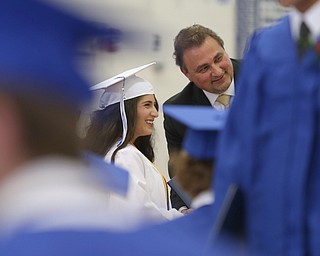 Marina Mediati shakes board member Larry Dinopoulos's hand after receiving her diploma during the Poland Seminary High School Graduation, Saturday, May 27, 2017 in Poland...(Nikos Frazier | The Vindicator)