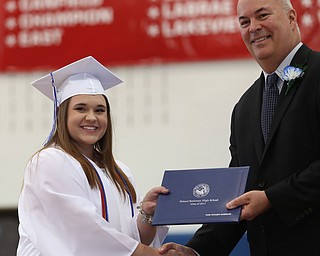Paige Shoemaker shakes board member Richard Weaver's hand after receiving her diploma during the Poland Seminary High School Graduation, Saturday, May 27, 2017 in Poland...(Nikos Frazier | The Vindicator)