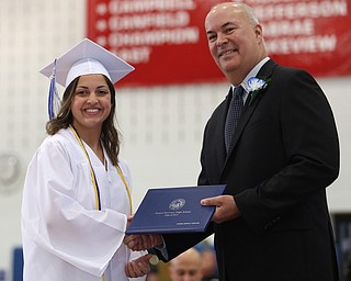 Mary VanSuch shakes board member Richard Weaver's hand after receiving her diploma during the Poland Seminary High School Graduation, Saturday, May 27, 2017 in Poland...(Nikos Frazier | The Vindicator)