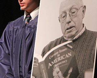 William D. Lewis The Vindicator  Warren JFK grad Zachary Lewis stands near a photo of John Gillen, longtime JFK athletic director who died recently. Gillen was honored during the 5-27-17  commencement ceremony at Packard Music Music Hall in Warren.