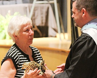 William D Lewis The Vindicator  Joseph Kenneally, President John F. Kennedy Catholic School, presents  Golden Eagle award to Gloria Gillen, widow of longtime JFK athletic director John Gillen who was honored duirng commencement ceremony.