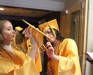 William D Lewis the Vindicator  South Range grads Kaitlyn Francis, left, and Katie Urs prepare for 5-27-17 commencement at South Range High School.