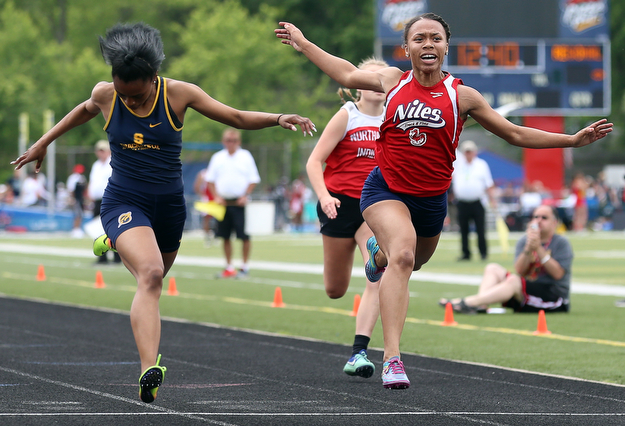 MICHAEL G TAYLOR | THE VINDICATOR- 05-27-16 - D2 Track & Field Regional at Austintown Fitch High School in Austintown, OH.In Girl's 100m,  Niles McKinley's Kyndia Matlock finish 4th and qualifies for state by .003 of a second.