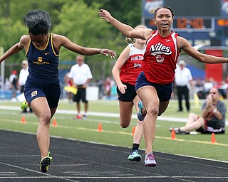 MICHAEL G TAYLOR | THE VINDICATOR- 05-27-16 - D2 Track & Field Regional at Austintown Fitch High School in Austintown, OH.In Girl's 100m,  Niles McKinley's Kyndia Matlock finish 4th and qualifies for state by .003 of a second.