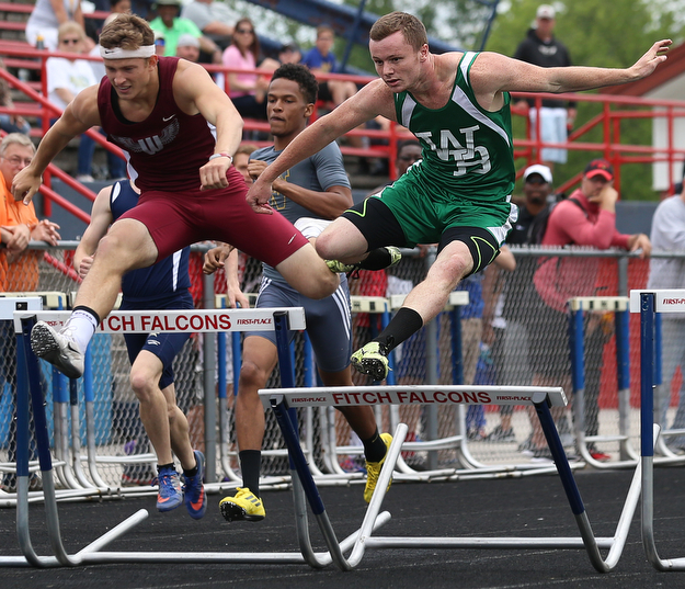 MICHAEL G TAYLOR | THE VINDICATOR- 05-27-16 - D2 Track & Field Regional at Austintown Fitch High School in Austintown, OH.Boy's 300m hurdles, West Branch's Rob Lozier wins to qualify for state.