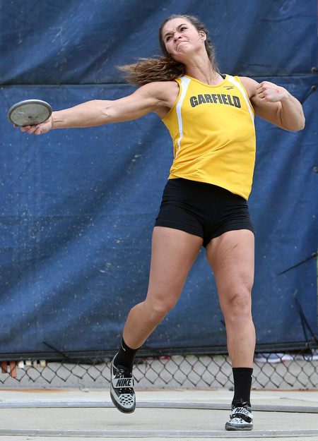 MICHAEL G TAYLOR | THE VINDICATOR- 05-27-16 - D2 Track & Field Regional at Austintown Fitch High School in Austintown, OH.In Girl's discus,  2 time defending state champion Garfield's Lauren Jones finishes 2nd and qualifies for state.