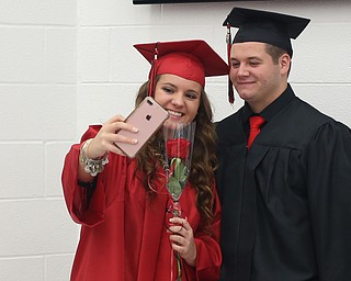 Peyton McLaughlin and Jim McIntee take a selfie before the Struthers High School Graduation, Sunday, May 28, 2017 in Struthers...(Nikos Frazier | The Vindicator)
