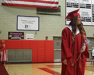 Students walk into the Struthers Field house during the Struthers High School Graduation, Sunday, May 28, 2017 in Struthers...(Nikos Frazier | The Vindicator)