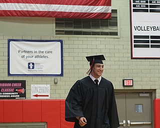 Alec Musolino walks into the Struthers Field House during the Struthers High School Graduation, Sunday, May 28, 2017 in Struthers...(Nikos Frazier | The Vindicator)