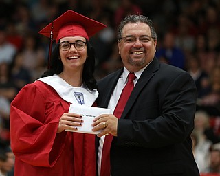Te'a Engstrom receives her diploma from board president Ron Shives during the Struthers High School Graduation, Sunday, May 28, 2017 in Struthers...(Nikos Frazier | The Vindicator)