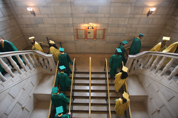 Students walk up the stairs before the Ursuline High School Graduation at Stambaugh Auditorium, Sunday, May 28, 2017 in Youngstown...(Nikos Frazier | The Vindicator)