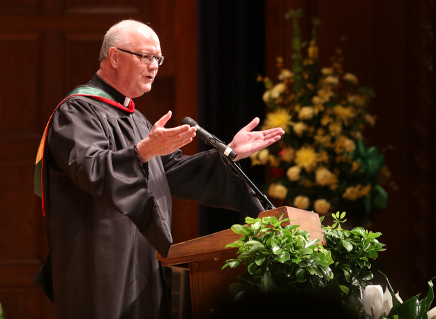Rev. Richard Murphy speaks during the Ursuline High School Graduation at Stambaugh Auditorium, Sunday, May 28, 2017 in Youngstown...(Nikos Frazier | The Vindicator)