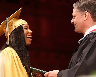 Ciel Vidale receives her diploma from Principal Matthew Sammartino during the Ursuline High School Graduation at Stambaugh Auditorium, Sunday, May 28, 2017 in Youngstown...(Nikos Frazier | The Vindicator)