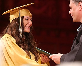 Brianna Bowell receives her diploma from Principal Matthew Sammartino during the Ursuline High School Graduation at Stambaugh Auditorium, Sunday, May 28, 2017 in Youngstown...(Nikos Frazier | The Vindicator)