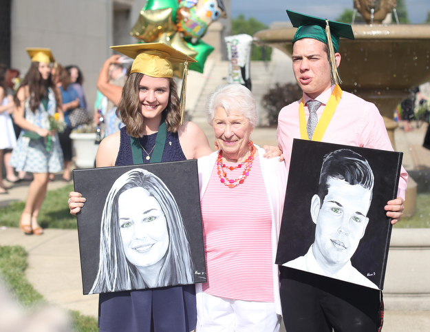 (from left) Carli Koewacich, Nancy Bielik and Joseph Koewacich poses for photos after the Ursuline High School Graduation at Stambaugh Auditorium, Sunday, May 28, 2017 in Youngstown...(Nikos Frazier | The Vindicator)