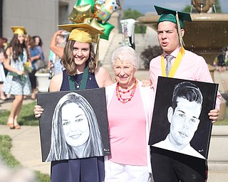 (from left) Carli Koewacich, Nancy Bielik and Joseph Koewacich poses for photos after the Ursuline High School Graduation at Stambaugh Auditorium, Sunday, May 28, 2017 in Youngstown...(Nikos Frazier | The Vindicator)