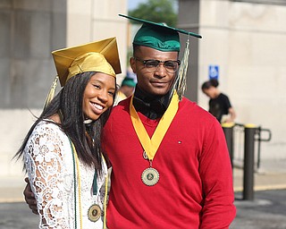 Ciel Vidale and Dawalyn Washington pose for photos after the Ursuline High School Graduation at Stambaugh Auditorium, Sunday, May 28, 2017 in Youngstown...(Nikos Frazier | The Vindicator)