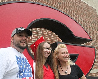 William D. Lewis The Vindicator Girard gradChristina Stein and her parents Rich and Jonetta Stein pose for a portrait near the large G before 5-28-17 commencement at Girard HS.