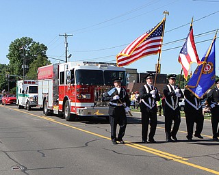 Members of the Boardman Firedepartment carried axes and and flags during the Memorial Day Parade in Boardman on Monday morning.   Dustin Livesay  |  The Vindicator  5/29/17  Boardman.