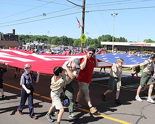 Members of the Boy Scouts local troops carry a large flag during the Memorial Day Parade in Boardman on Monday morning.   Dustin Livesay  |  The Vindicator  5/29/17  Boardman.