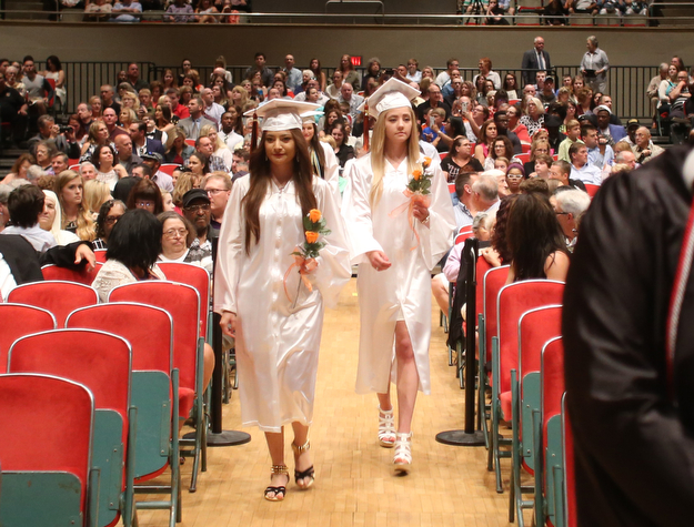 Students walk in during the Howland High School Graduation at Packard Music Hall, Wednesday, May 31, 2017 in Warren...(Nikos Frazier | The Vindicator)