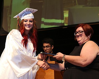 Regan Dieter shakes board member Susan Brucoli's hand after receiving her diploma during the Howland High School Graduation at Packard Music Hall, Wednesday, May 31, 2017 in Warren...(Nikos Frazier | The Vindicator)