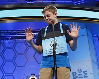 Will Rooke, 13, from Deephaven, Minn., reacts as he spells his word correctly in the third round of the 90th Scripps National Spelling Bee, Wednesday, May 31, 2017, in Oxon Hill, Md. (AP Photo/Alex Brandon)
