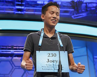 Joey Ilagan, 13, of Lexington, Ky., reacts as he spells his word in the third round of the 90th Scripps National Spelling Bee, Wednesday, May 31, 2017, in Oxon Hill, Md. (AP Photo/Alex Brandon)