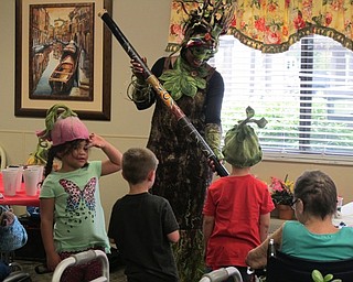 Neighbors | Alexis Bartolomucci.Adia Love performed the role of Mother Nature, or Gaia, and told a story to the Beeghly Oaks residents and Boardman United Methodist Preschool children on April 28.