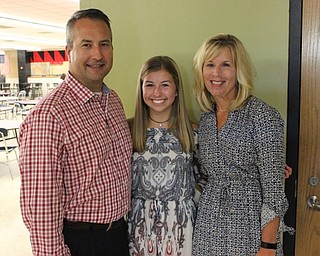 Neighbors | Abby Slanker.Canfield High School junior Amanda Petro was escorted by her parents, Jim and Erin Petro, to the National Honor Society Induction Ceremony on April 27.