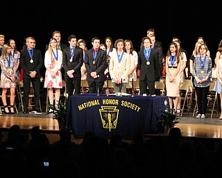 Neighbors | Abby Slanker.Canfield High School National Honor Society inductees took the NHS Membership Pledge during the Induction Ceremony on April 27.