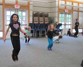 Neighbors | Alexis Bartolomucci.Students at Dobbins Elementary jump roped at one of the stations during DAWG Day on May 5.