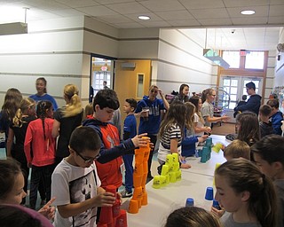 Neighbors | Alexis Bartolomucci.Students participated in a cup stacking and juggling station for DAWG Day at Dobbins Elementary School.
