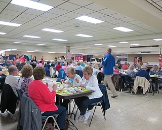 Neighbors | Alexis Bartolomucci.Austintown faculty and students served guests during the Spring Senior Citizens Dinner at Austintown Fitch High School on May 11.