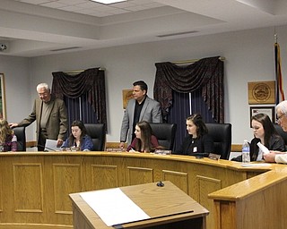 Neighbors | Abby Slanker.Canfield City Council members, from left, (back) Mayor Bernie Kosar, Don Dragish and Chuck Tieche helped coach Canfield High School students through a mock city council meeting during the 37th annual Civic Day sponsored by the Rotary Club of Canfield on May 5.