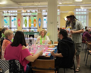 Neighbors | Alexis Bartolomucci.Guests interrogated suspects during the Murder in the Library: Hulas and Homicides program on May 11 at the Poland library.