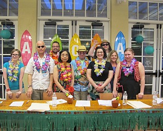 Neighbors | Alexis Bartolomucci.Cast members were portrayed by volunteers, many who work for the Public Library of Youngstown and Mahoning County. Pictured are, from left, (back) Stuart Gibbs, John Waller; (middle) Melissa Guthrie, John Yingling, Kevin Clark, Jen Kuczek; (front) Mary Yee, Nicole DiPiero and Mallory Wiand.