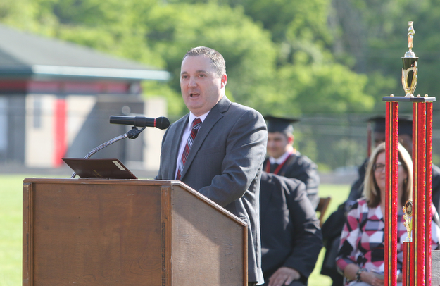        ROBERT K. YOSAY  | THE VINDICATOR...over 60 Graduates of Campbell High School received their diplomas at the John Knapic Stadium... Capt. William J Toti  Commencement speaker