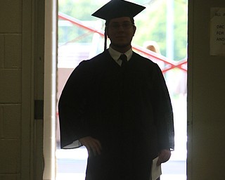        ROBERT K. YOSAY  | THE VINDICATOR...over 60 Graduates of Campbell High School received their diplomas at the John Knapic Stadium.Class president - Paul Tropea.. walks out to get his diploma