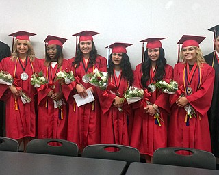  ROBERT K. YOSAY  | THE VINDICATOR...Members of Campbell Memorial High School's National Honor Society pose before receiving their diplomas at commencement Thursday evening at Campbell's John Knapic Field.
