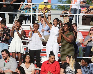        ROBERT K. YOSAY  | THE VINDICATOR...over 60 Graduates of Campbell High School received their diplomas at the John Knapic Stadium...Happy Family members cheer