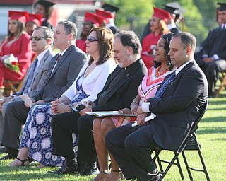        ROBERT K. YOSAY  | THE VINDICATOR...over 60 Graduates of Campbell High School received their diplomas at the John Knapic Stadium...Speaker  principal and dignitaries listen to the valedictorian speech