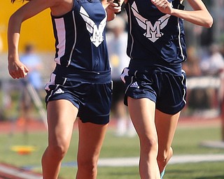 Bella Woldord(205)(left) hands off the baton to Sela Jones(206) of McDonald in the DIII Girls 4 x 800 relay final during the 2017 OHSAA Boys and Girls State Track and Field Tournaments, Friday, June 2, 2017 at the Jesse Owens Memorial Stadium in Columbus...(Nikos Frazier | The Vindicator)