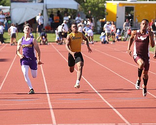 Kayron Adams(center) of Harding competes in the DI boys 100 meter dash semifinal during the 2017 OHSAA Boys and Girls State Track and Field Tournaments, Friday, June 2, 2017 at the Jesse Owens Memorial Stadium in Columbus...(Nikos Frazier | The Vindicator)