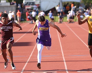 Brandon Adams of Maple Heights, Garret Alger of Massillon Jackson and  Kayron Adams(180) of Harding compete in the DI boys 100 meter dash semifinal during the 2017 OHSAA Boys and Girls State Track and Field Tournaments, Friday, June 2, 2017 at the Jesse Owens Memorial Stadium in Columbus...(Nikos Frazier | The Vindicator)